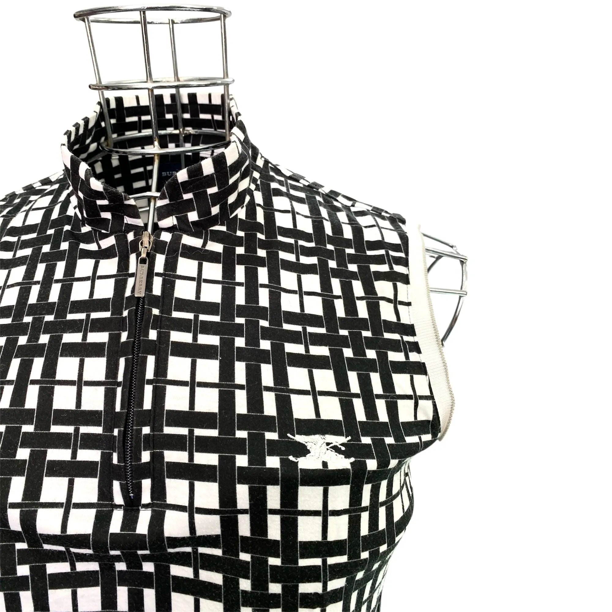 Maglia smanicata collo alto con chiusura zip
