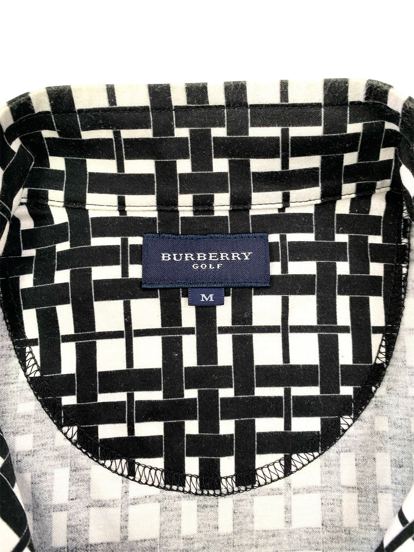 Maglia smanicata collo alto con chiusura zip