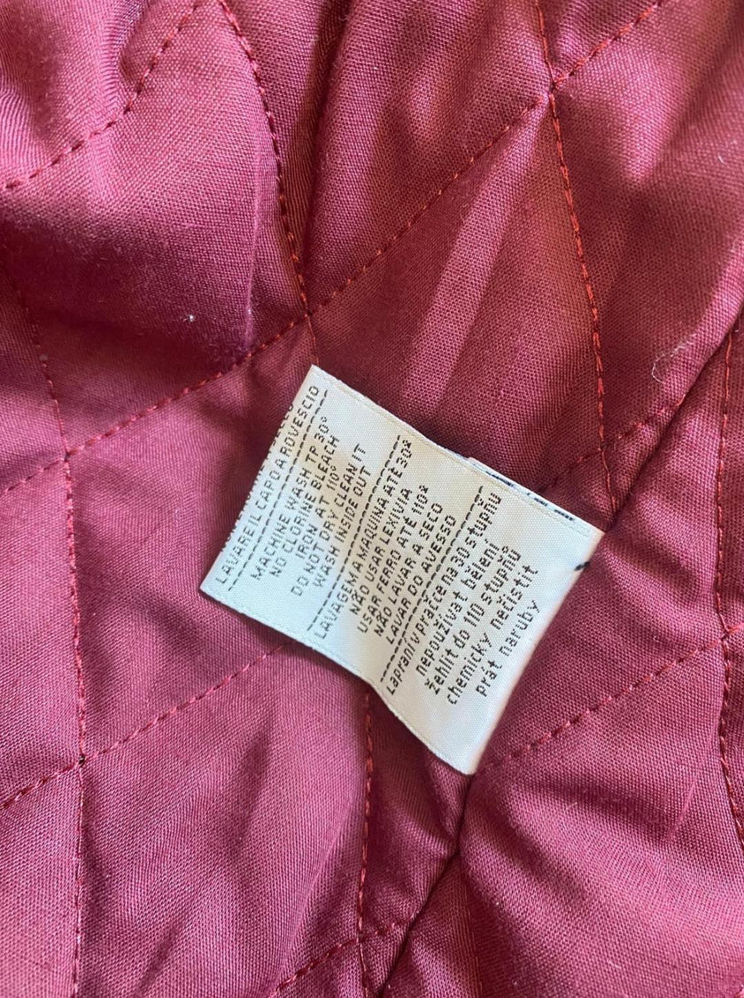 Giacca bomber texture perforata con chiusura zip e colletto a fascia