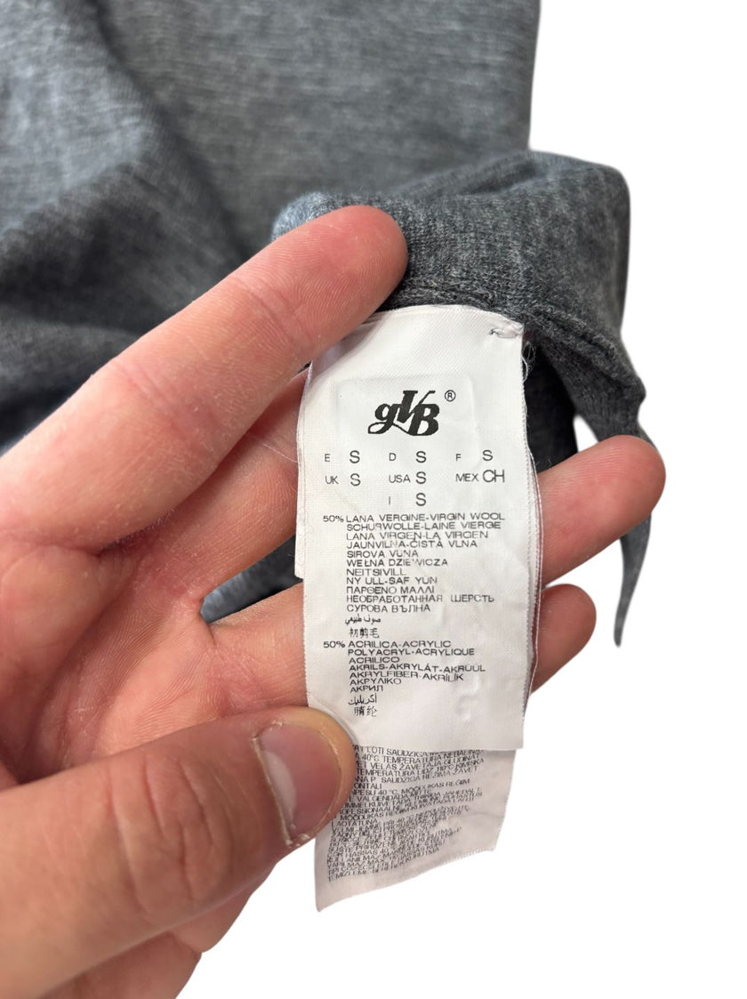 Maglia maniche corte con bottoni nascosti e colletto a contrasto