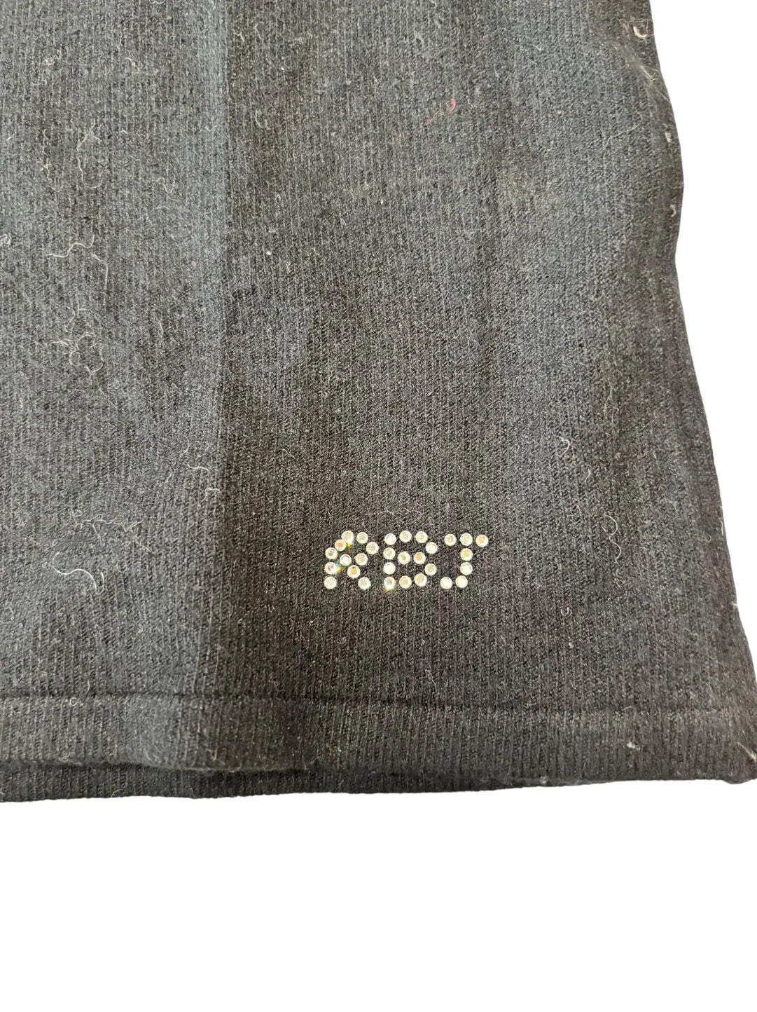 Maglia dolcevita giromaniche con micro dettagli strass