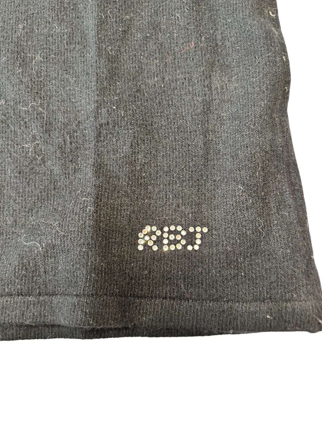 Maglia dolcevita giromaniche con micro dettagli strass