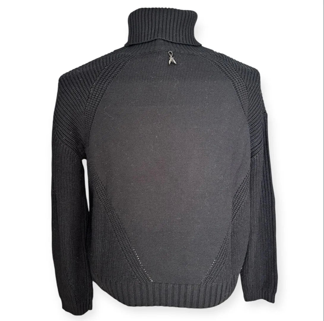 Maglia dolcevita con motivo intrecciato sulle maniche e con bordo e collo a costine