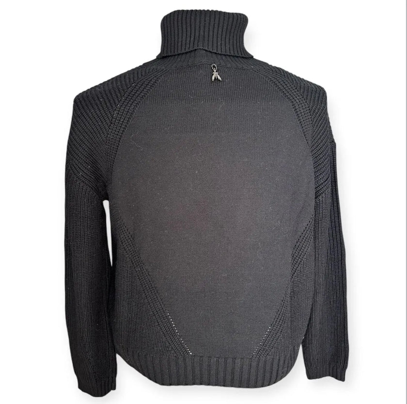 Maglia dolcevita con motivo intrecciato sulle maniche e con bordo e collo a costine
