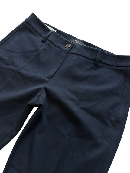 Pantaloni eleganti vita taglio dritto con chiusura decentrata con bottone