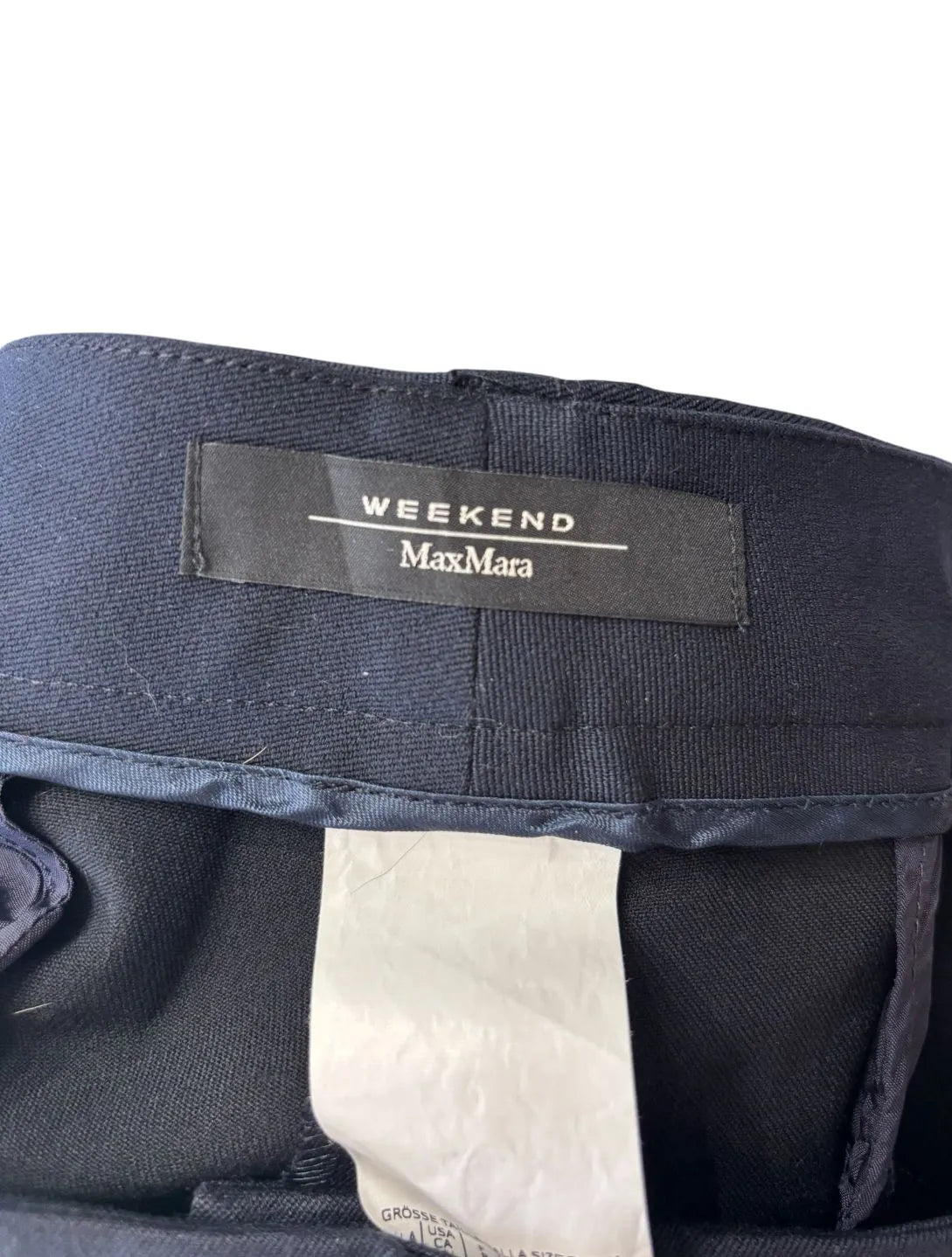 Pantaloni eleganti vita taglio dritto con chiusura decentrata con bottone