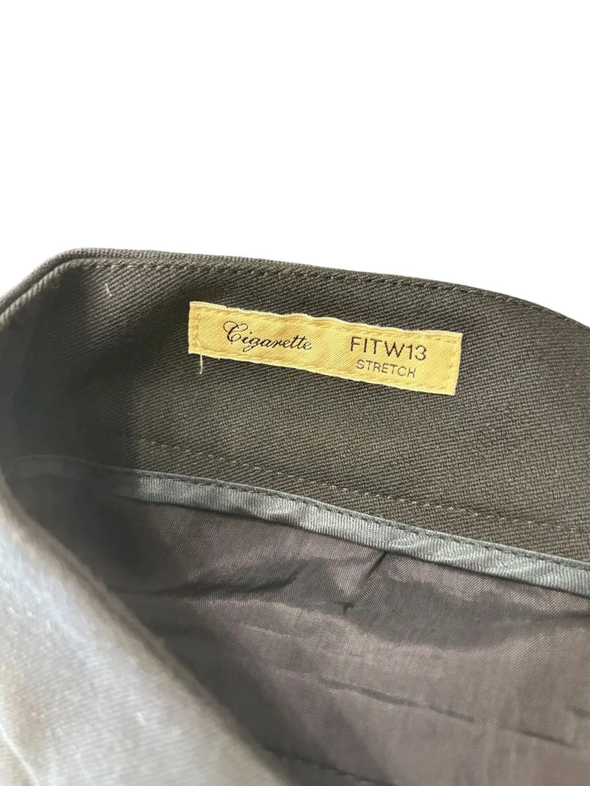 Pantaloni eleganti vita taglio dritto con chiusura decentrata con bottone