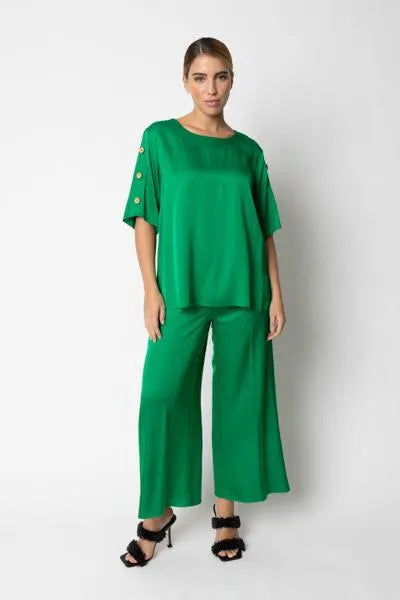 Blusa con bottoni laterali